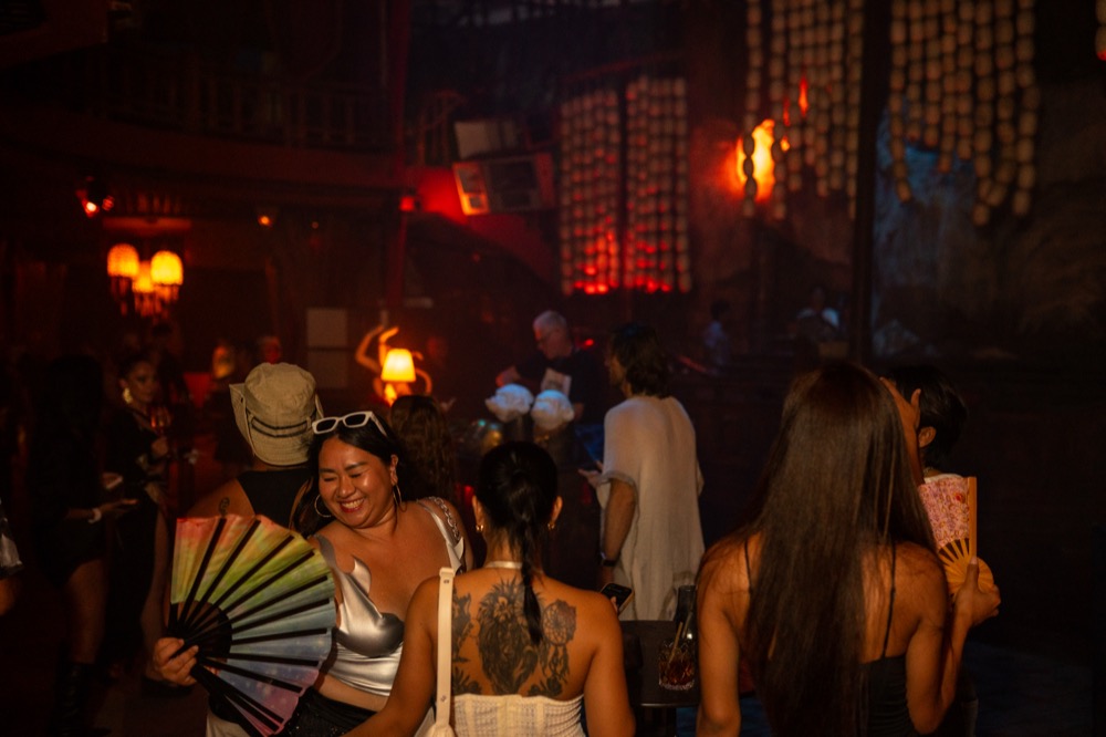 Guests dancing and laughing at BABOU's club night
