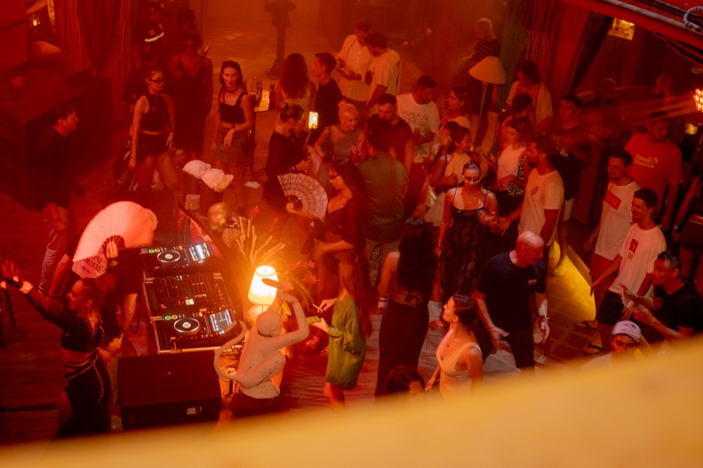 Guests dancing under lights at BABOU