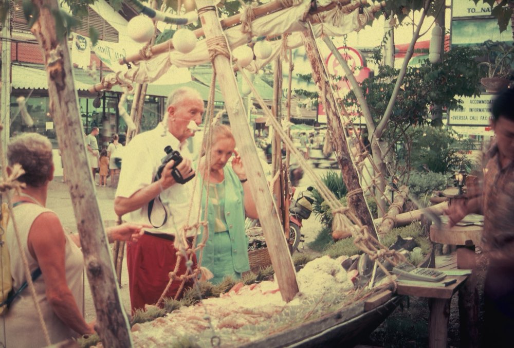 Guests choosing from the fresh catch on the seafood boat display