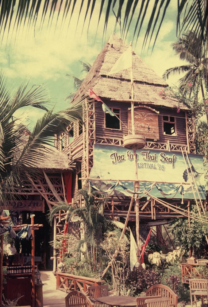 The Drop In treehouse tower and Tha Lay Thai Seafood Festival banner