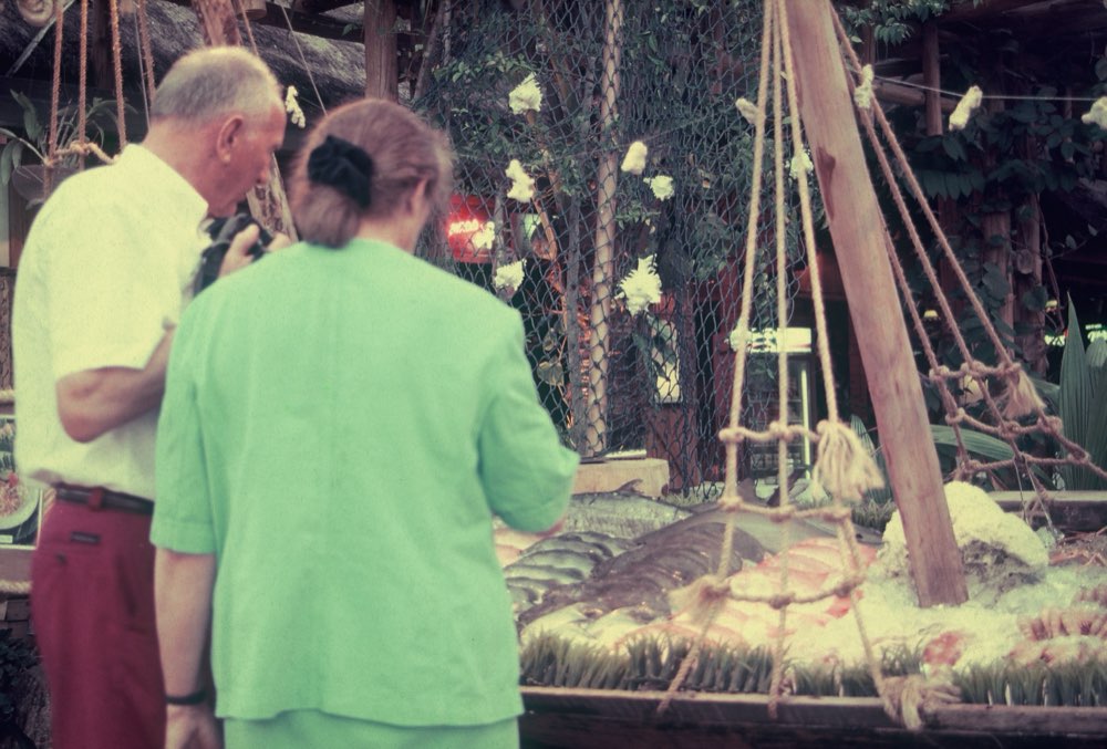 Guests photographing the fresh seafood display at Drop In