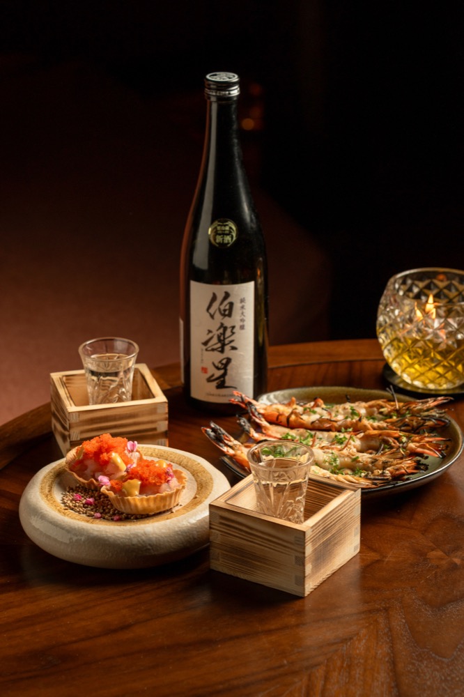 A crudo tart and grilled prawns at BABOU's Raw Bar